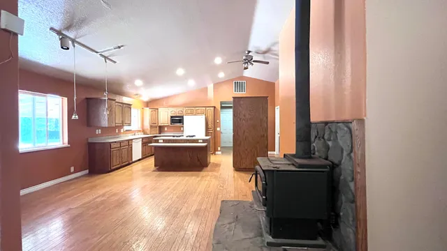a living room with furniture and a table