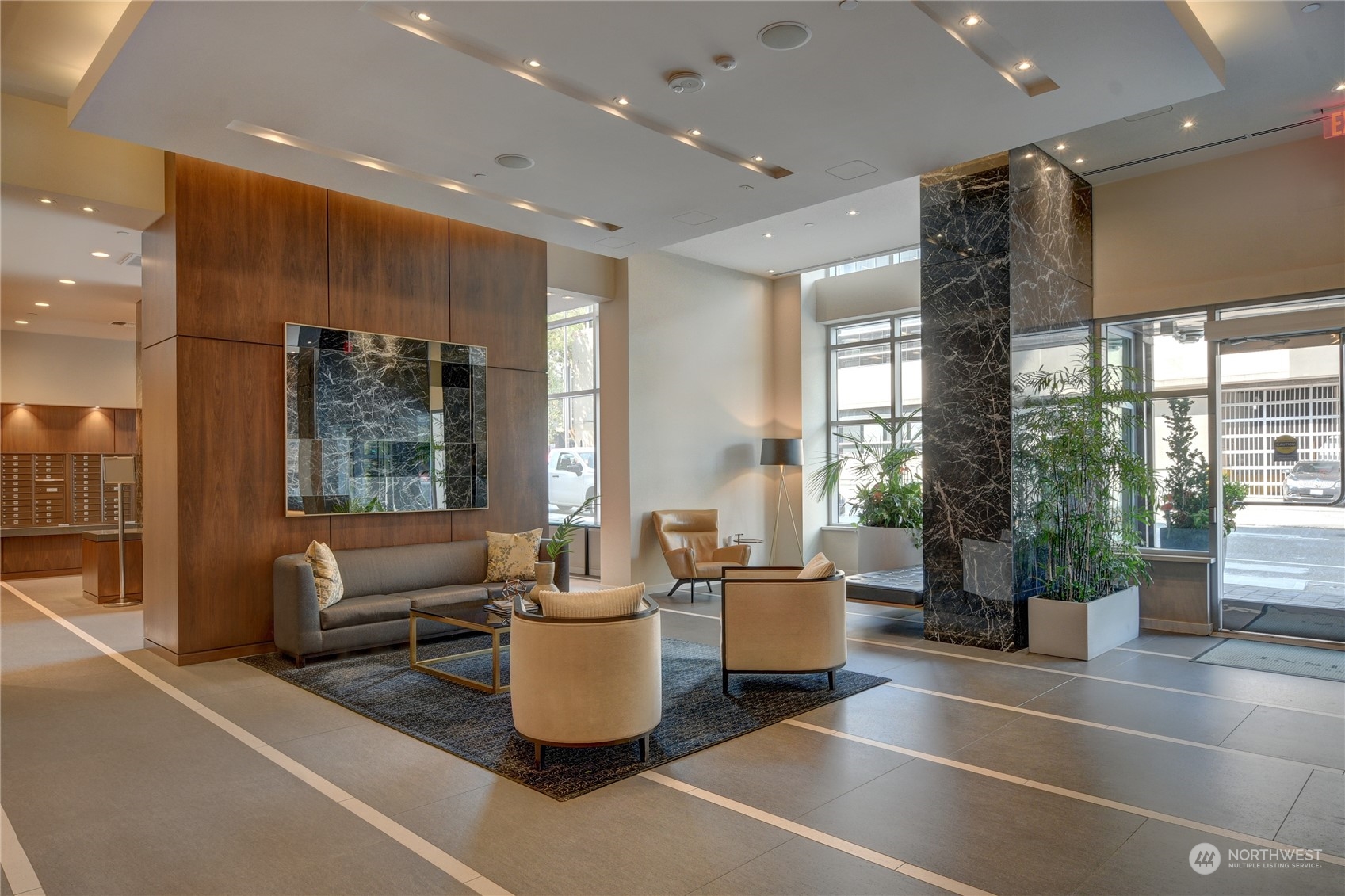 583 Battery Street, Unit 1601N Seattle, WA 98121 - Photo 12 of 27 a large room with windows and view of living room