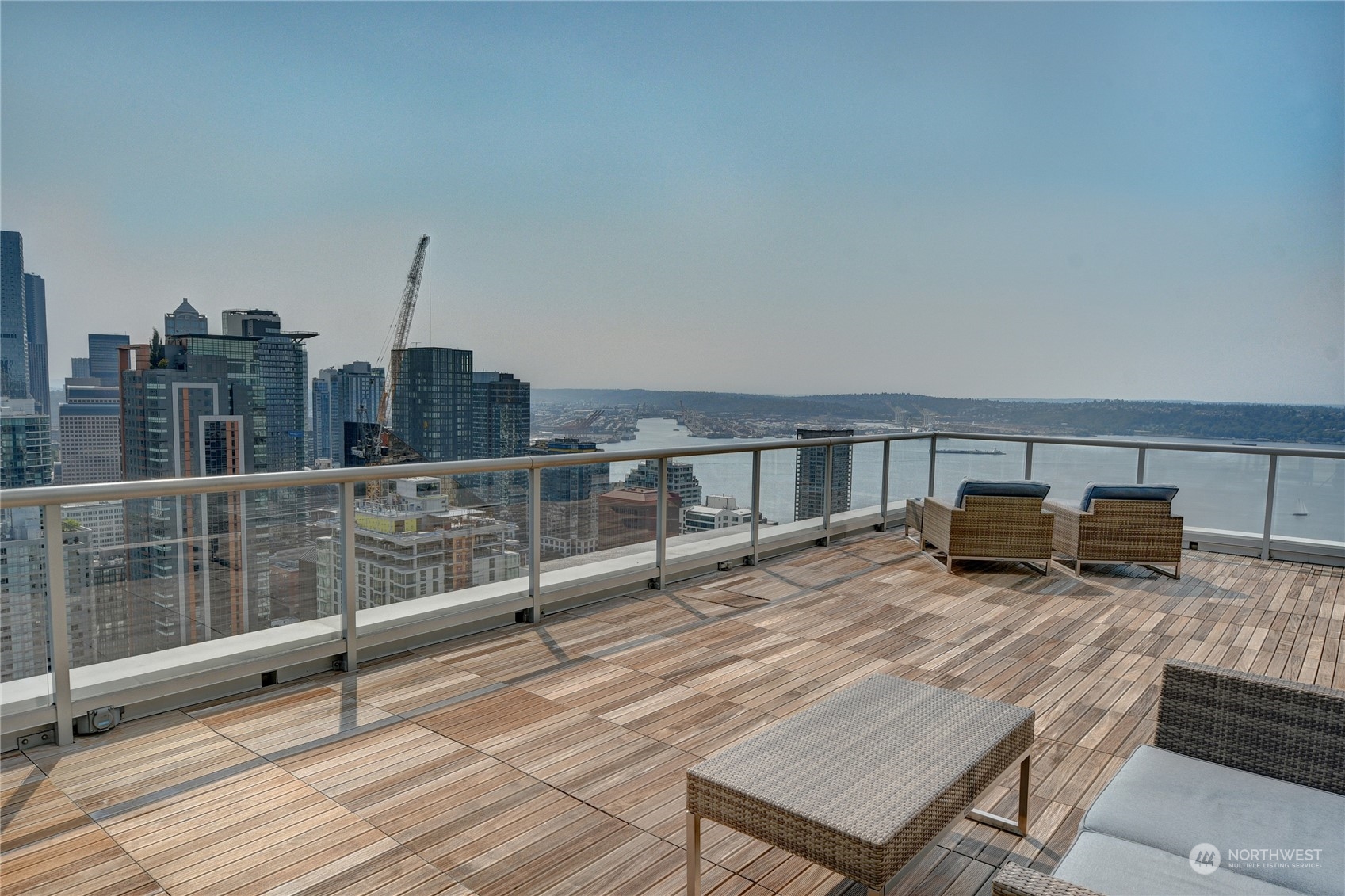 583 Battery Street, Unit 1601N Seattle, WA 98121 - Photo 18 of 27 a view of a terrace with sitting area