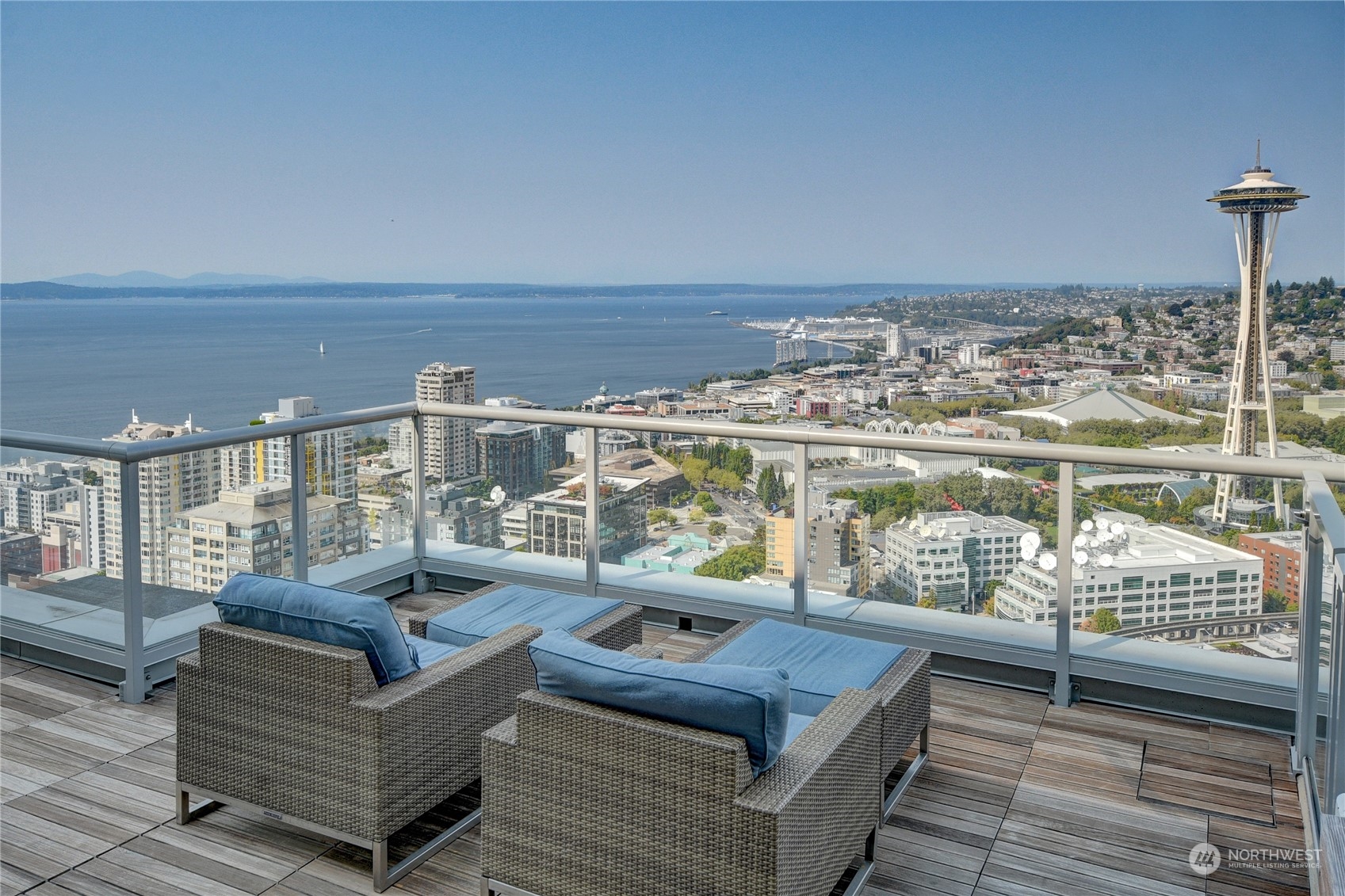 583 Battery Street, Unit 1601N Seattle, WA 98121 - Photo 20 of 27 a living room with furniture and a large window