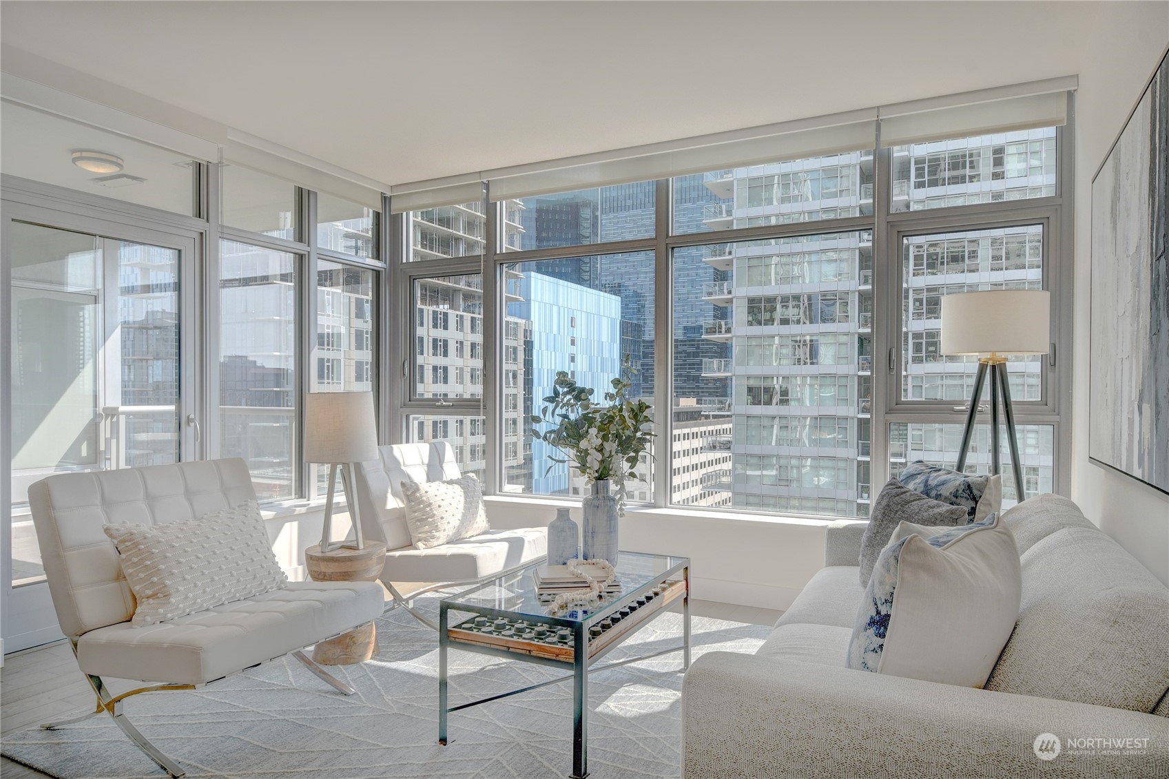 583 Battery Street, Unit 1601N Seattle, WA 98121 - Photo 2 of 27 a living room with furniture and a large window