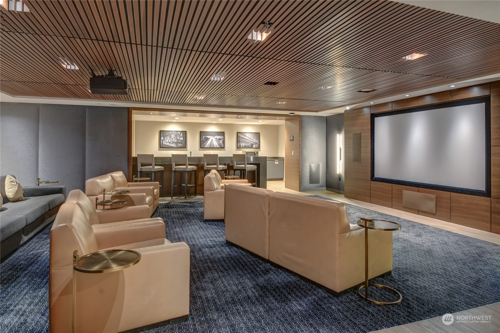 583 Battery Street, Unit 1601N Seattle, WA 98121 - Photo 27 of 27 a living room with furniture and a flat screen tv