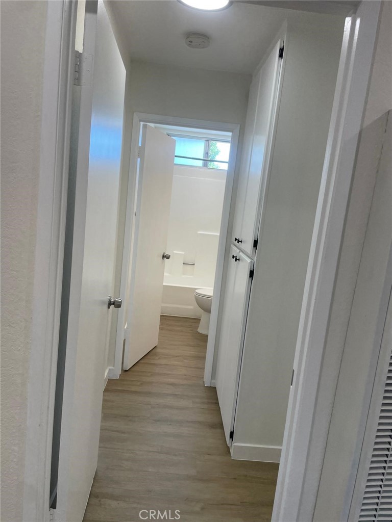 8135 Reseda Boulevard, Unit 9 Reseda, CA 91335 - Photo 3 of 8 a bathroom with a sink and toilet