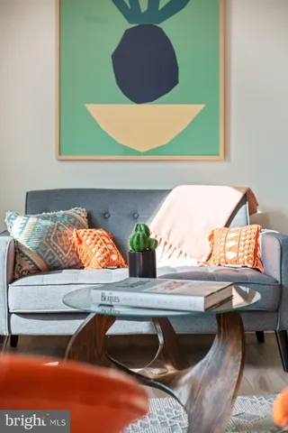 a living room with furniture and a window