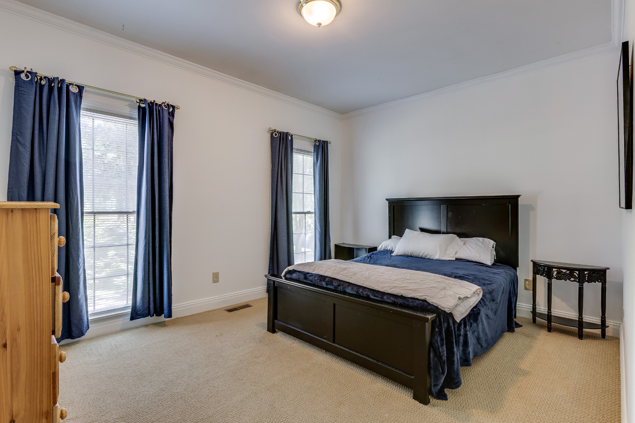1111 Temple Ridge Court Nashville, TN 37221 - Photo 32 of 46 a bedroom with a bed and a night stand