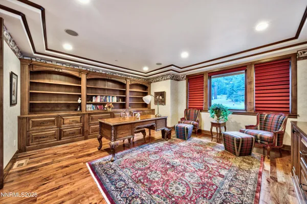 a spacious bathroom with a granite countertop tub sink and mirror