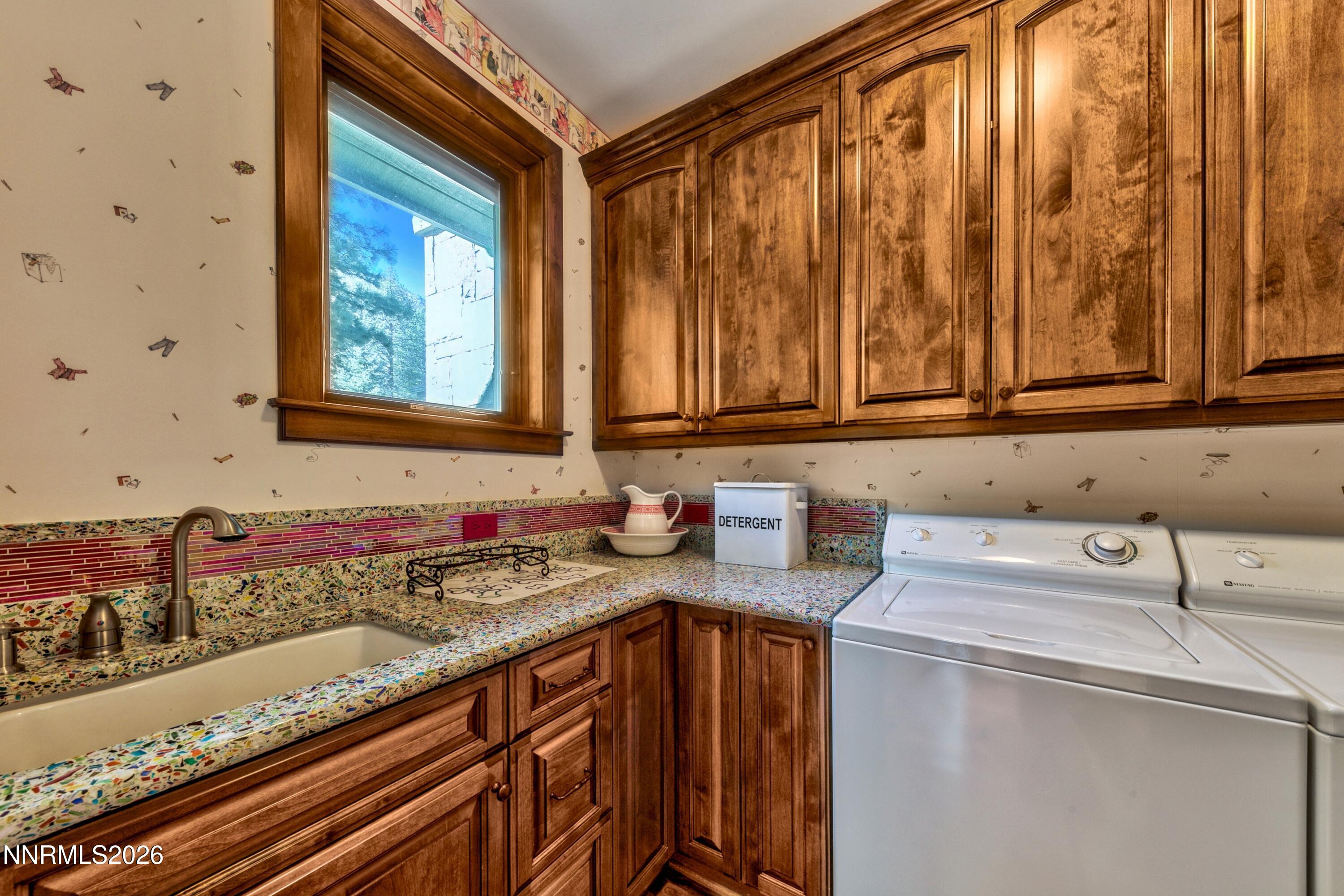 229 Five Creek Road Gardnerville, NV 89460 - Photo 39 of 50 a view of a sink and cabinets