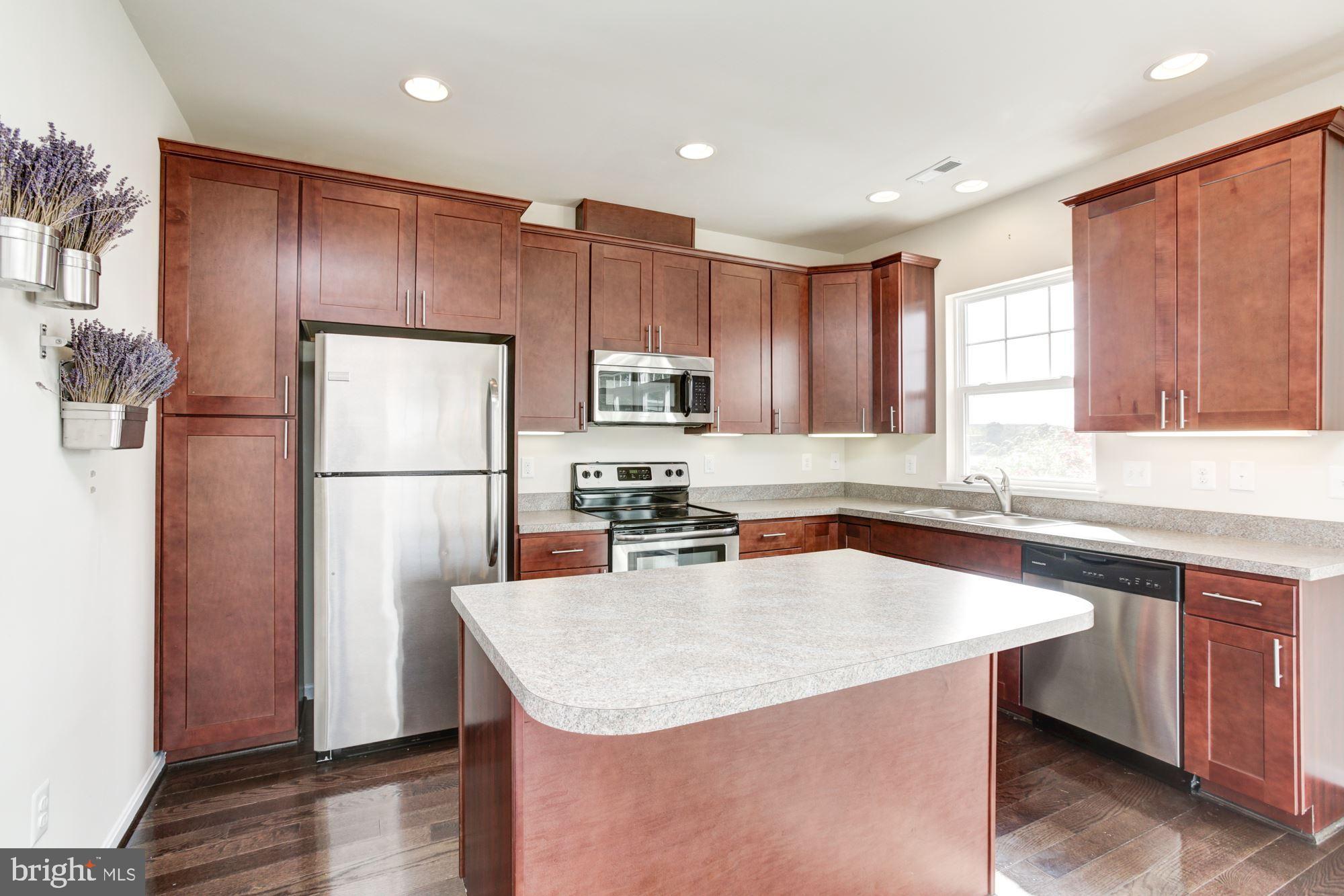 2071 Case Road Baltimore, MD 21222 - Photo 8 of 61 Kitchen - Hardwood flooring