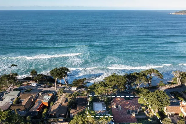 a view of a street with an ocean view