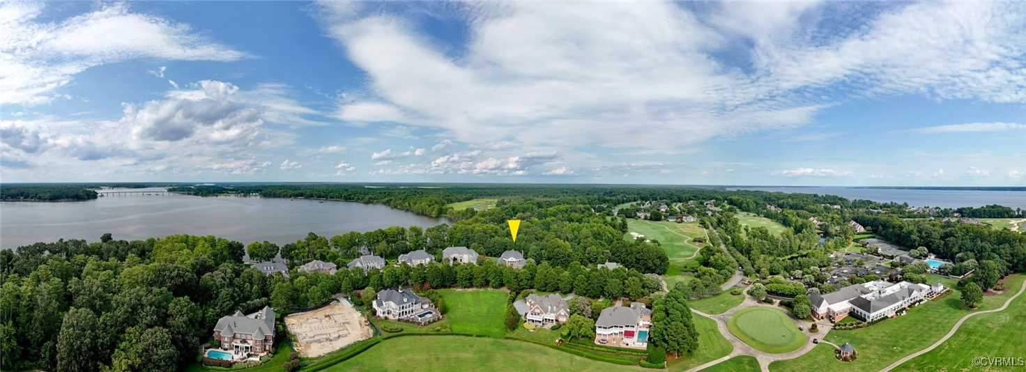 1220 Two Rivers Point Williamsburg, VA 23185 - Photo 2 of 50 a view of a garden with a lot of flower plants and wooden floor