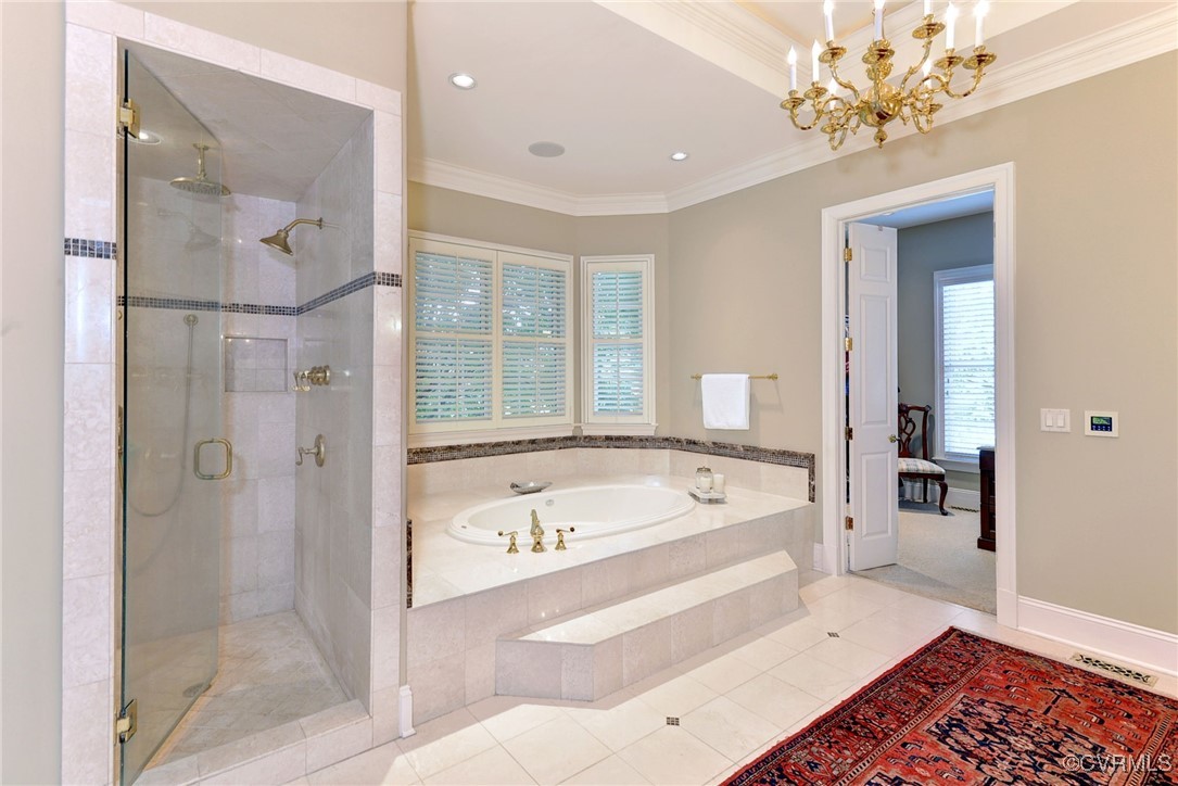 1220 Two Rivers Point Williamsburg, VA 23185 - Photo 26 of 50 a bathroom with a tub a sink and mirrors