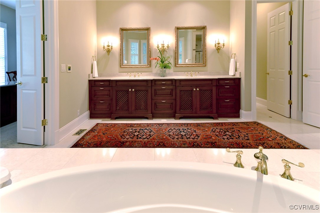 1220 Two Rivers Point Williamsburg, VA 23185 - Photo 27 of 50 a bathroom with a bathtub and a sink