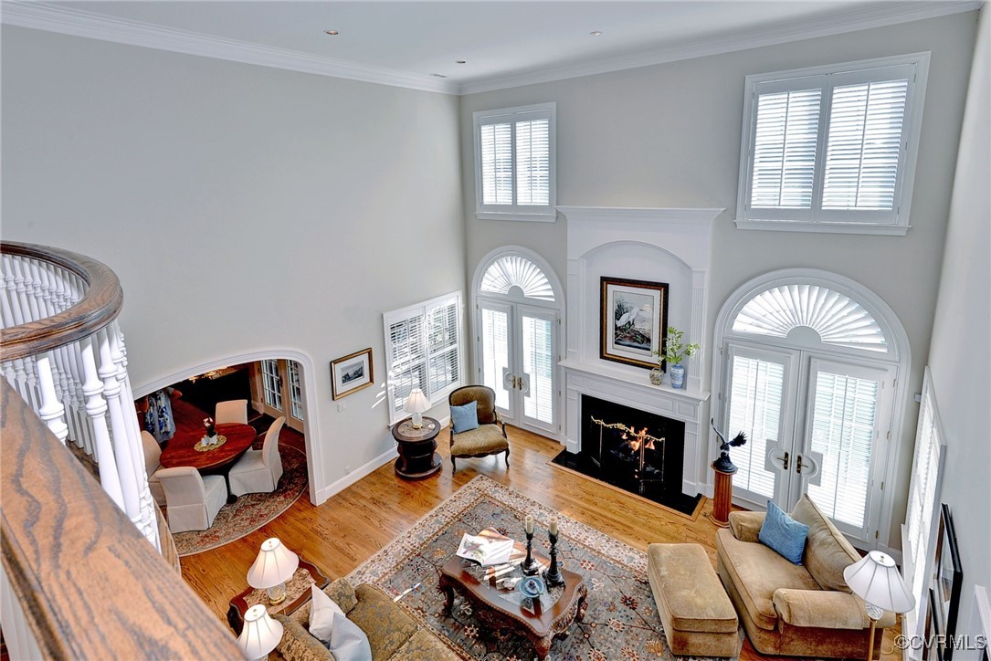 1220 Two Rivers Point Williamsburg, VA 23185 - Photo 29 of 50 a living room with furniture a fireplace and a flat screen tv