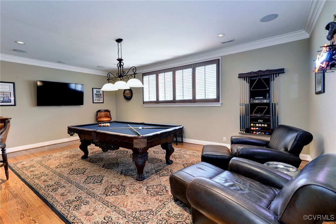 1220 Two Rivers Point Williamsburg, VA 23185 - Photo 39 of 50 a living room with furniture and a flat screen tv
