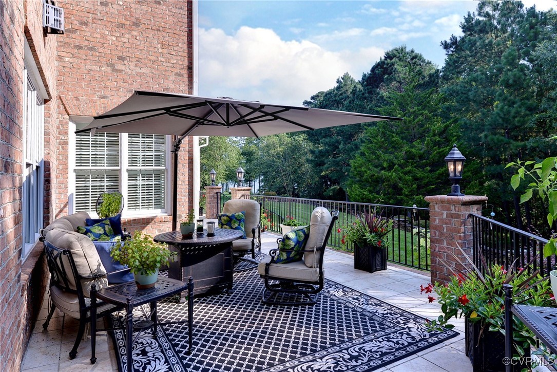 1220 Two Rivers Point Williamsburg, VA 23185 - Photo 45 of 50 a view of a chair and table in the patio