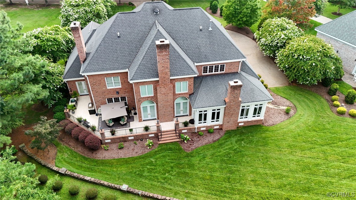 1220 Two Rivers Point Williamsburg, VA 23185 - Photo 48 of 50 an aerial view of a house with swimming pool and garden
