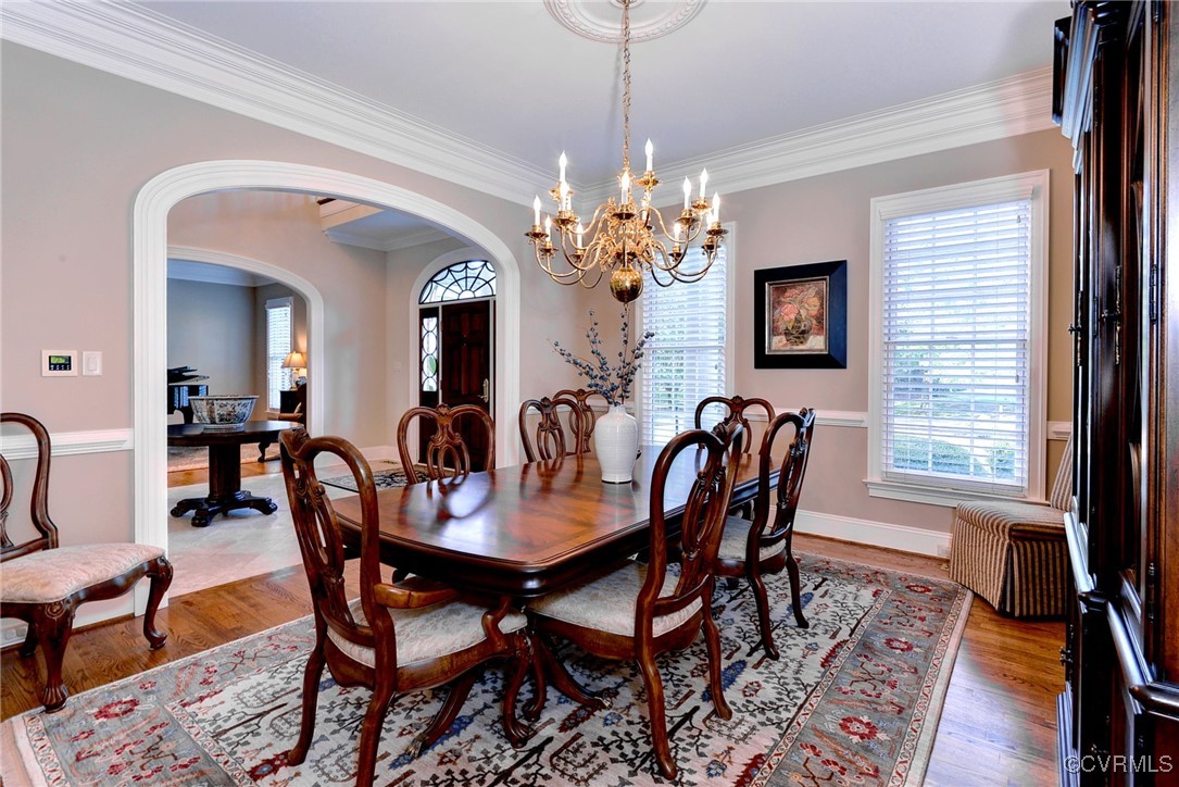 1220 Two Rivers Point Williamsburg, VA 23185 - Photo 9 of 50 a view of a dining room with furniture window and wooden floor