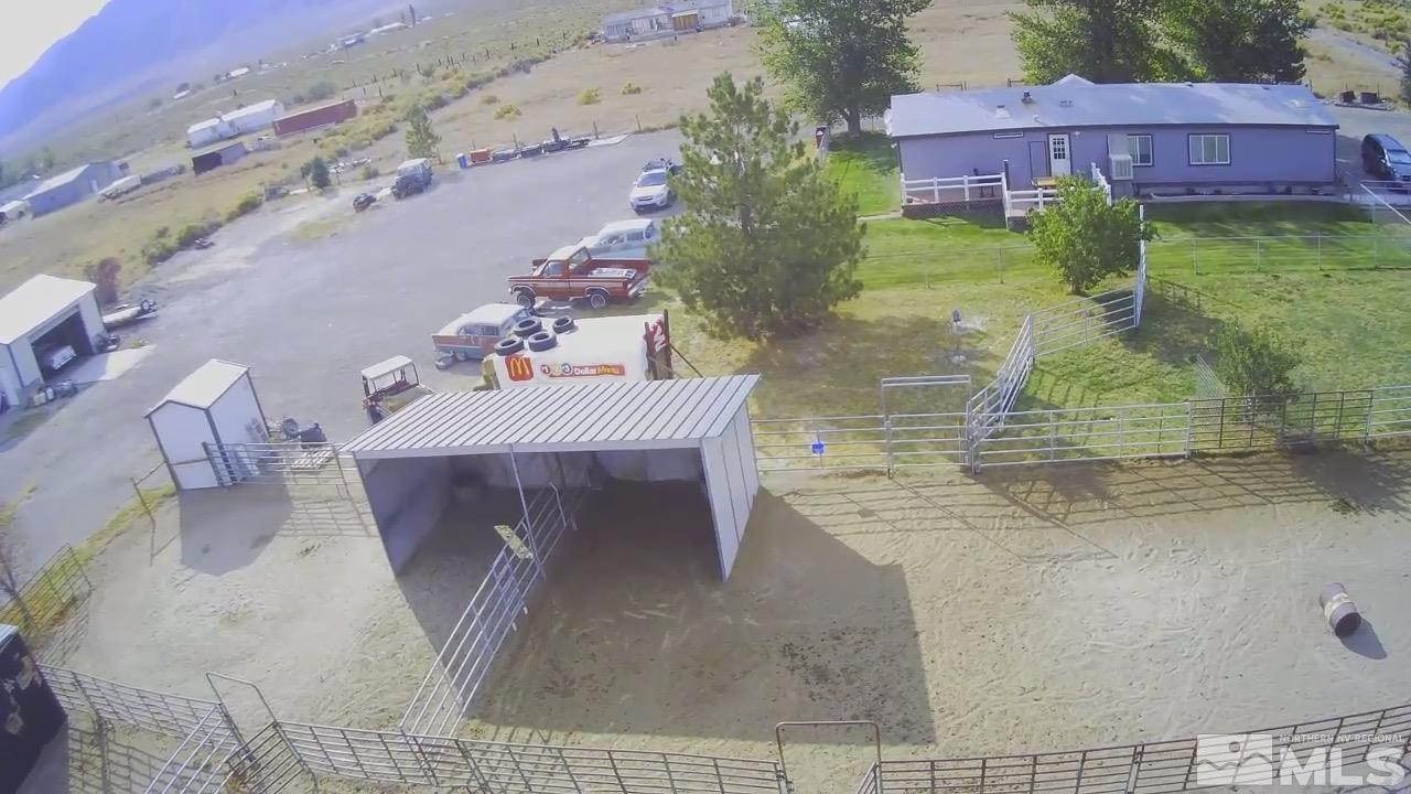 451 Manley Ranch Road Round Mountain, NV 89045 - Photo 29 of 40 an aerial view of a house with a yard