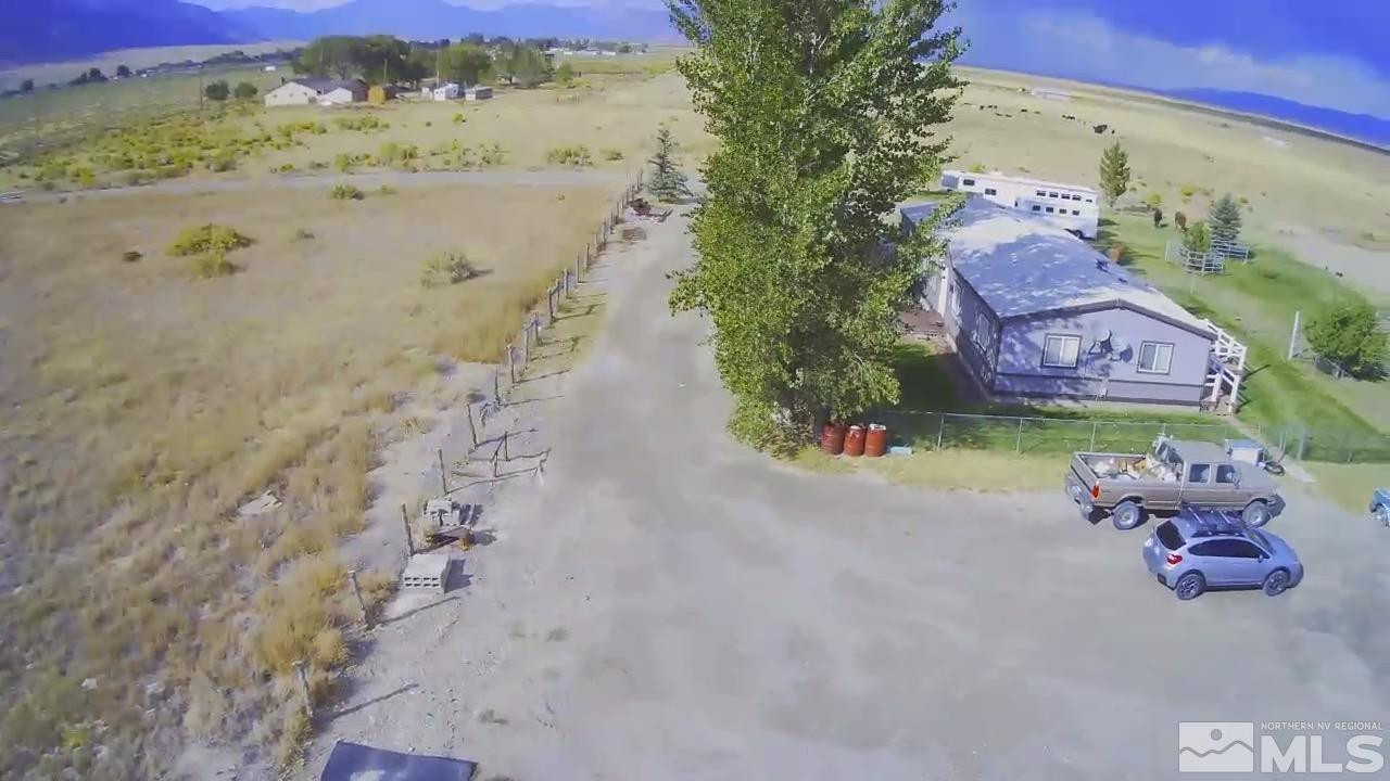 451 Manley Ranch Road Round Mountain, NV 89045 - Photo 31 of 40 a view of a yard with a garden