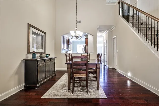 a view of a dining room with furniture and window