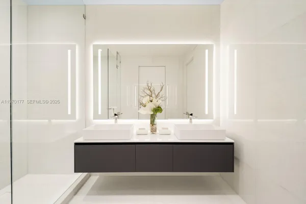 a bathroom with a bathtub and a sink