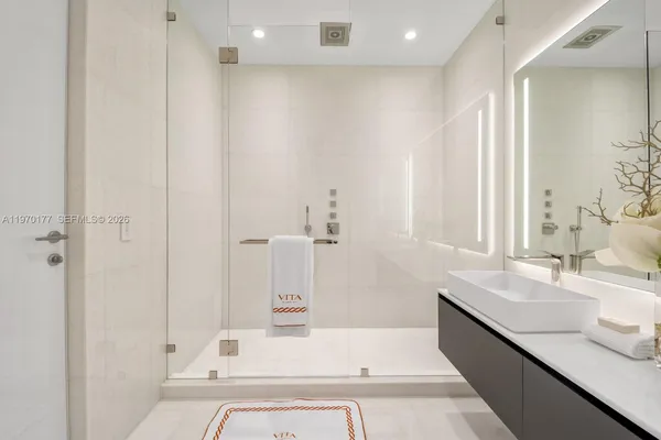 a bathroom with a bathtub and a sink