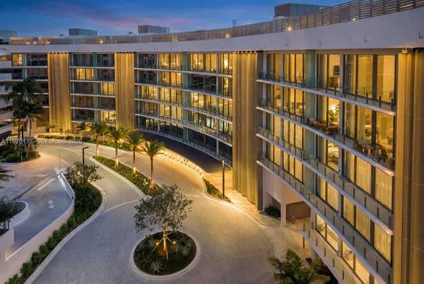 a view of swimming pool with outdoor seating