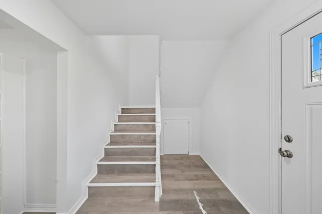 a view of an entryway with staircase