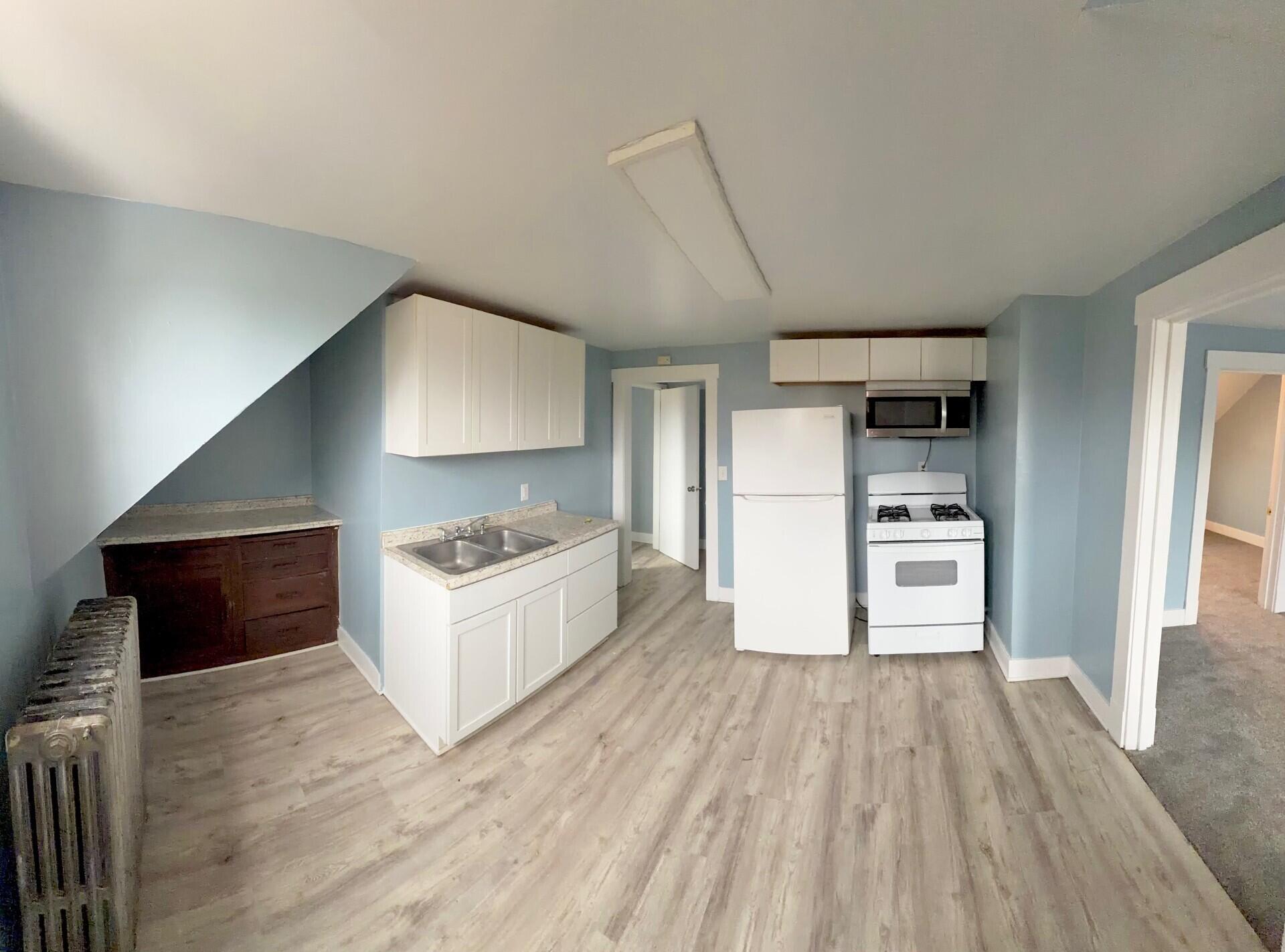 2011 Madison Street Manitowoc, WI 54220 - Photo 2 of 16 Upper Kitchen