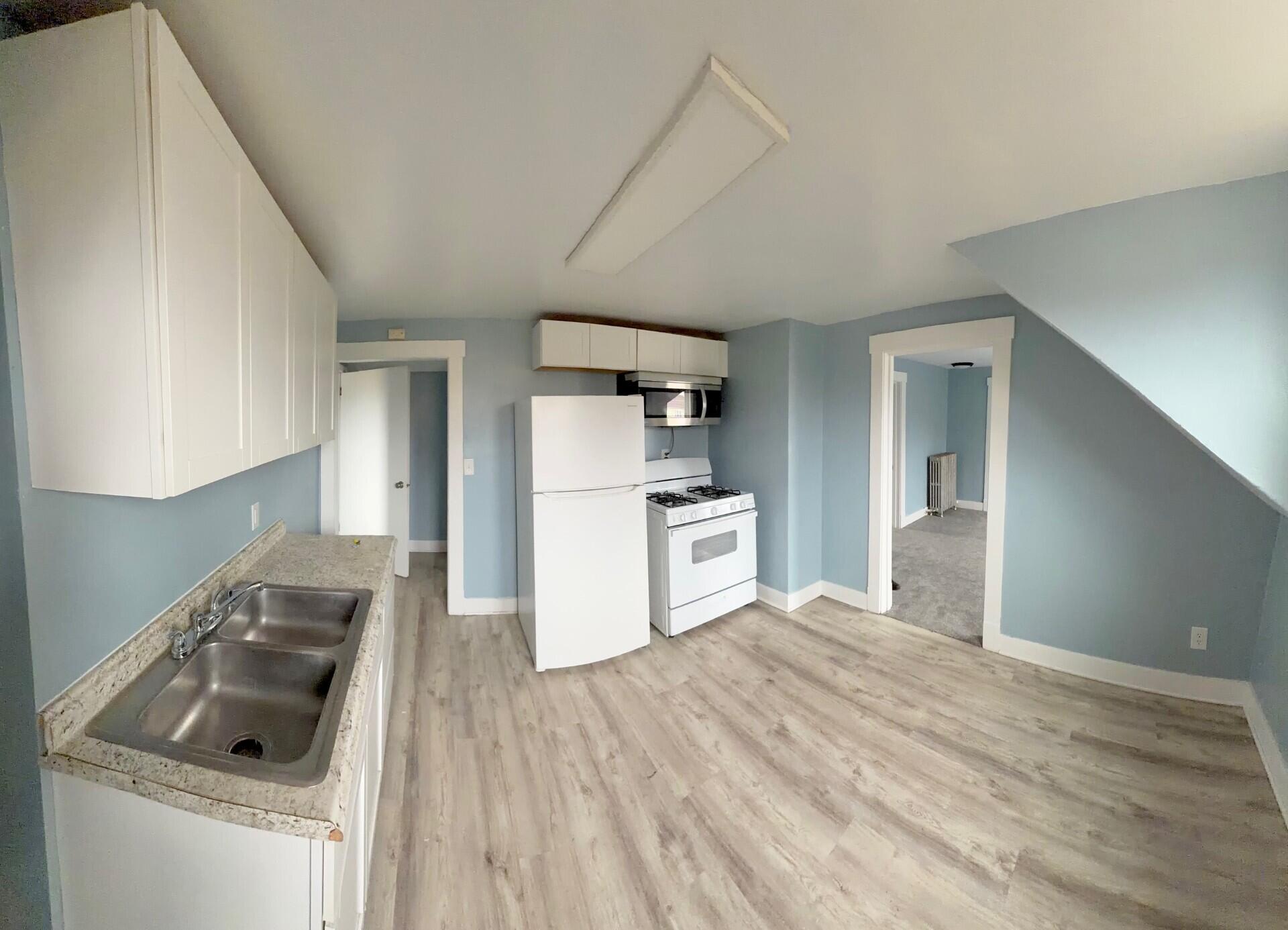 2011 Madison Street Manitowoc, WI 54220 - Photo 3 of 16 Upper Kitchen