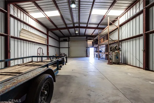 a view of a garage with furniture
