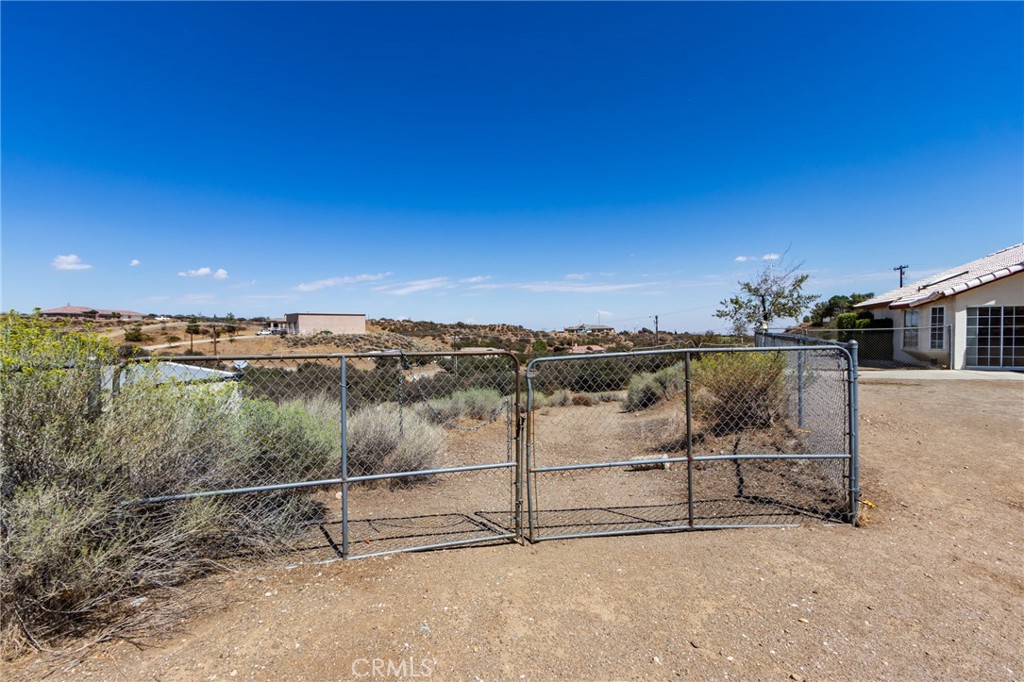 7170 Joshua Road Oak Hills, CA 92344 - Photo 58 of 58 a view of a terrace with a bench
