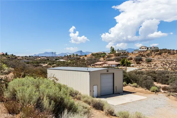 a house view with a outdoor space