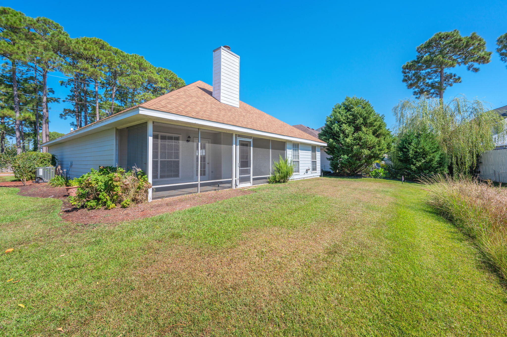35 Lake Front Drive Miramar Beach, FL 32550 - Photo 29 of 29 a front view of a house with garden