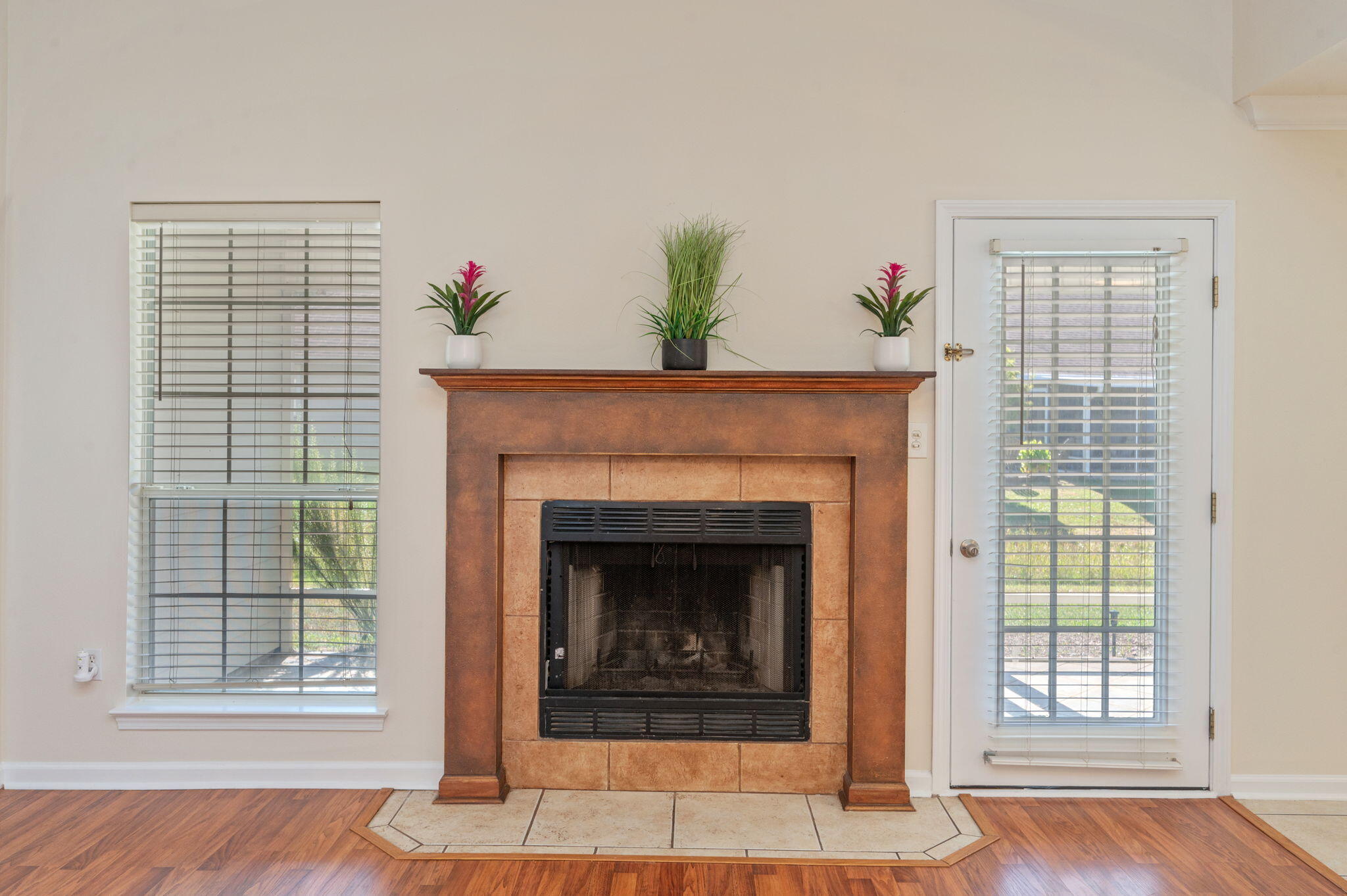 35 Lake Front Drive Miramar Beach, FL 32550 - Photo 7 of 29 a living room with a fireplace and a window
