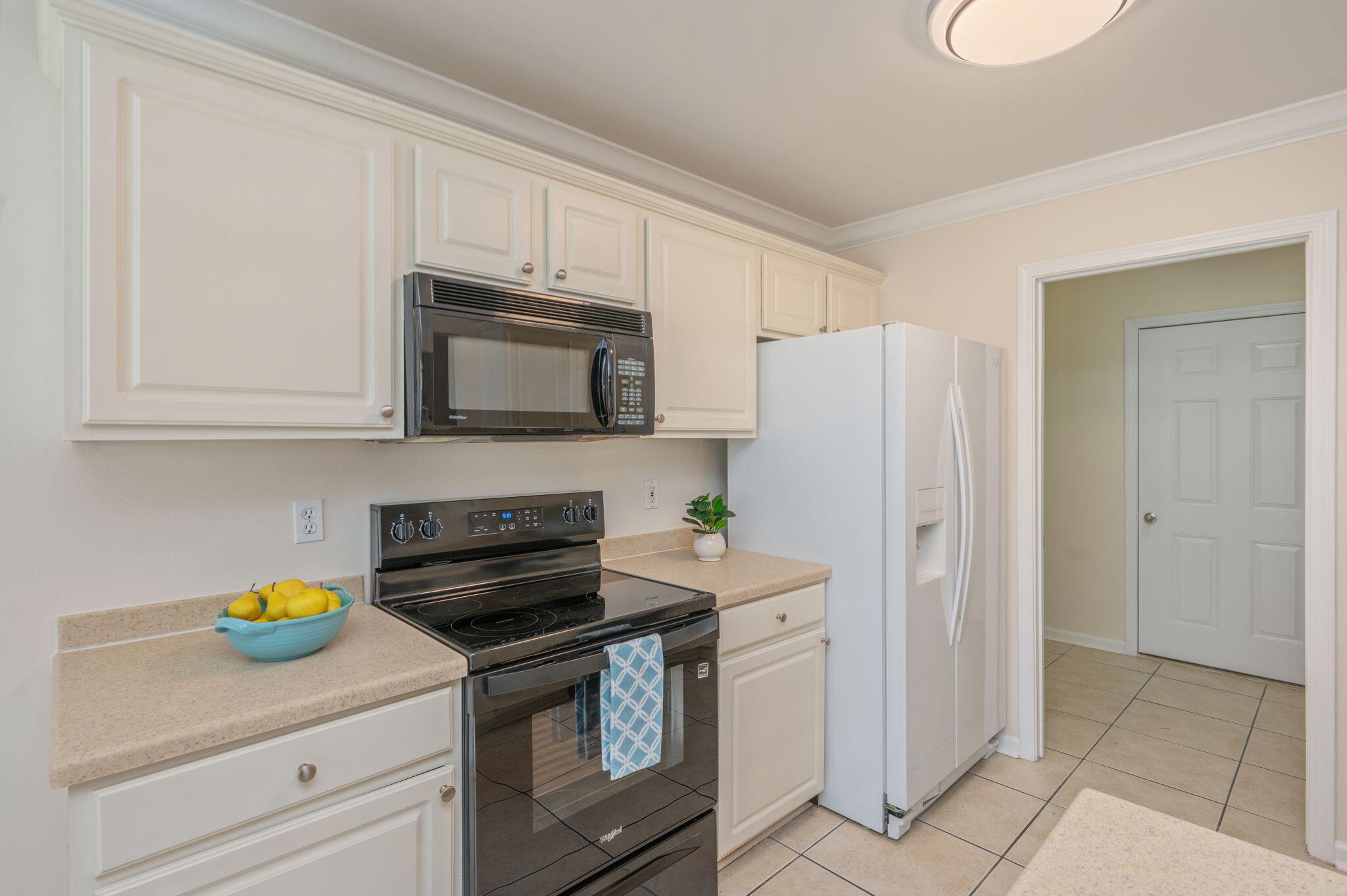 35 Lake Front Drive Miramar Beach, FL 32550 - Photo 9 of 29 a kitchen with appliances a microwave and cabinets