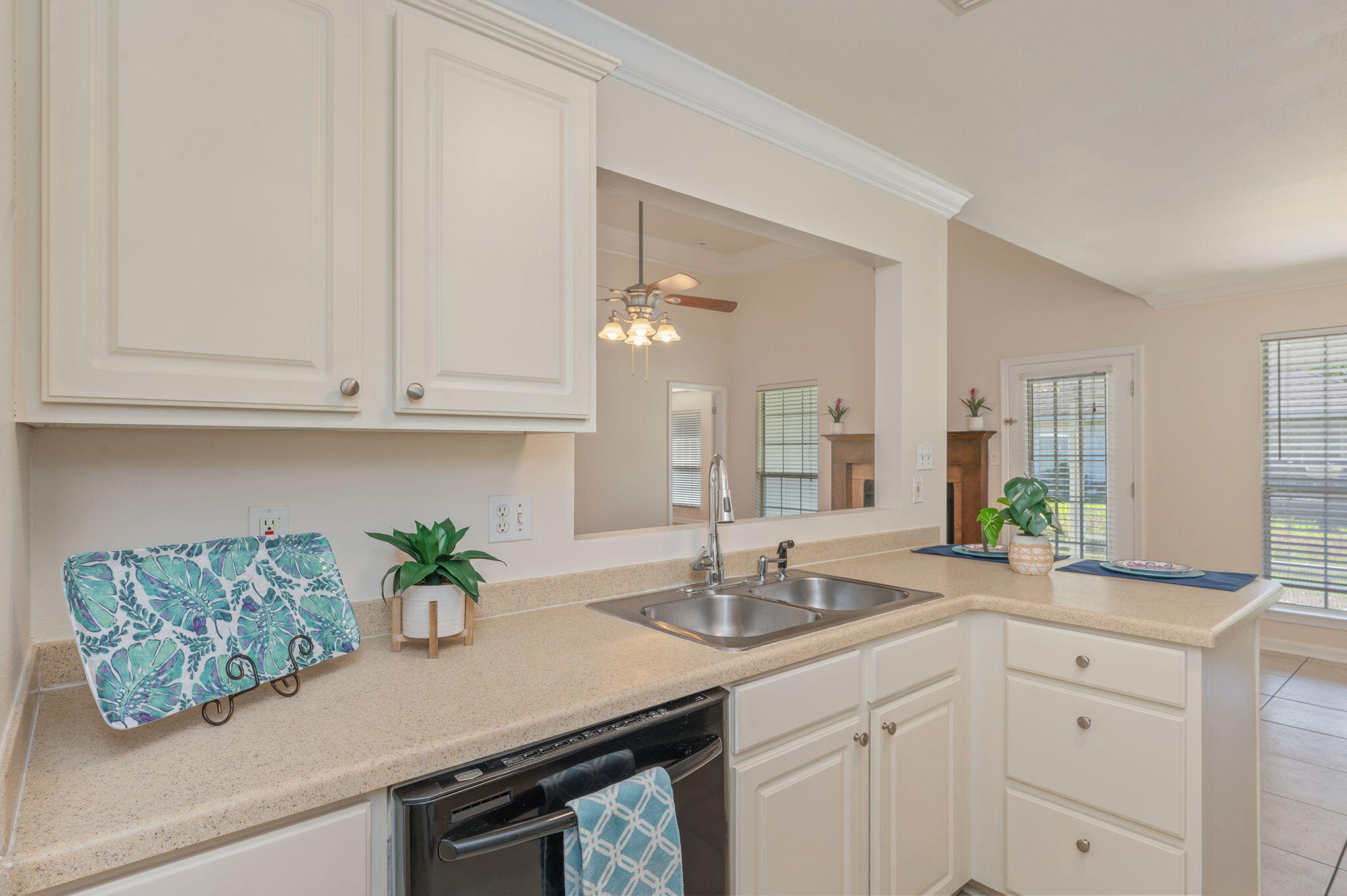 35 Lake Front Drive Miramar Beach, FL 32550 - Photo 10 of 29 a kitchen with white cabinets and a sink