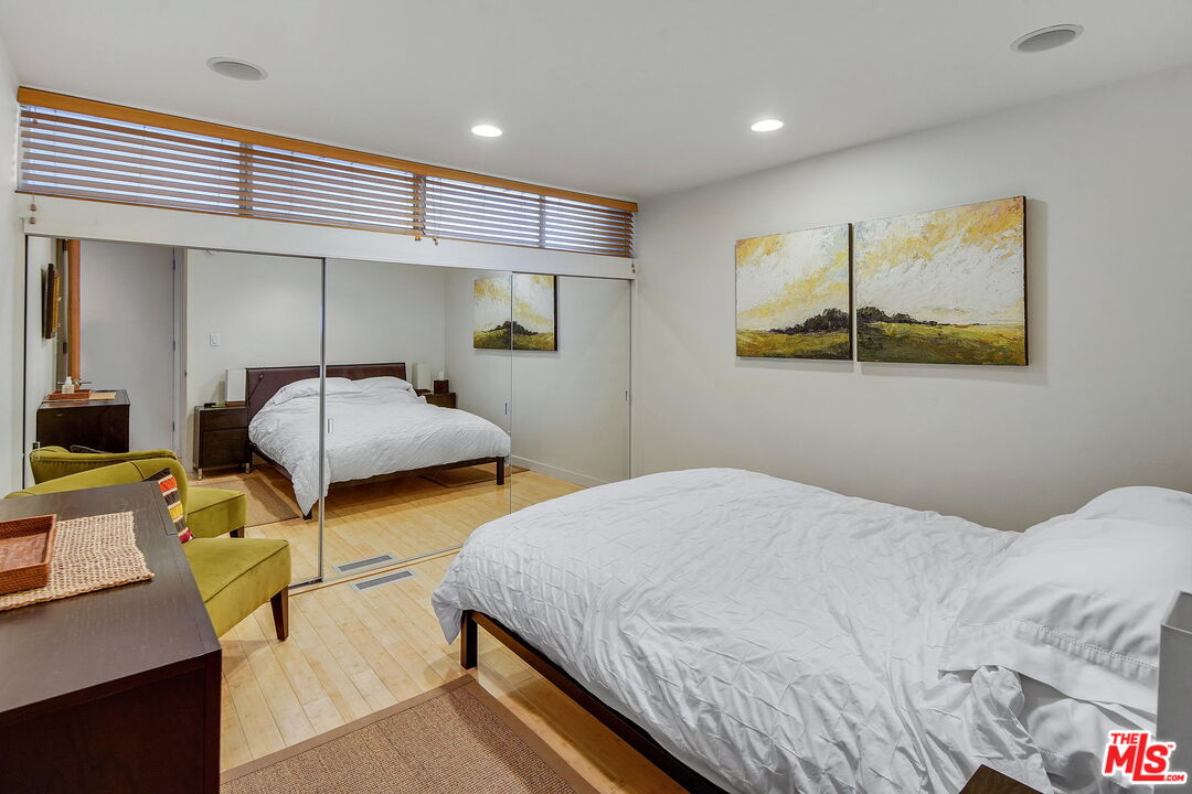 2 Ketch Street, Unit 102 Marina del Rey, CA 90292 - Photo 13 of 22 a bedroom with bed and window