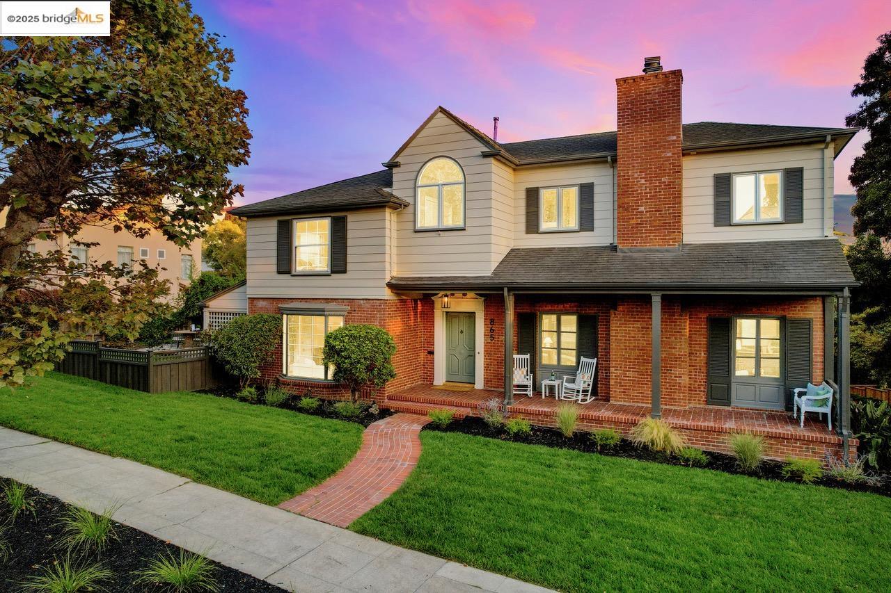 865 Longridge Road Oakland, CA 94610 - Photo 1 of 1 a front view of a house with a yard