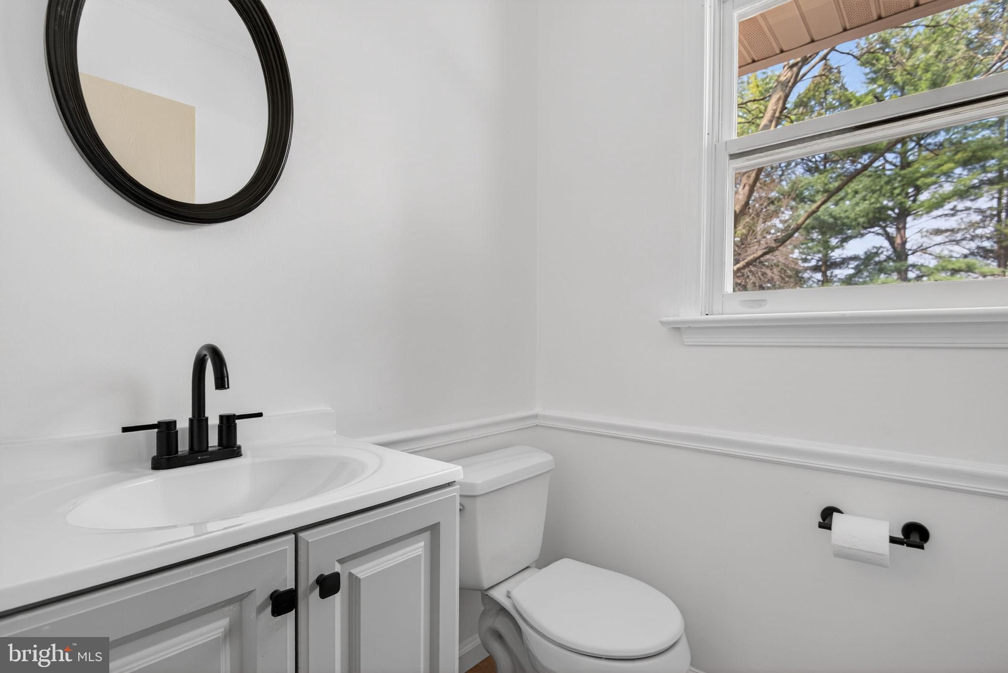 2348 Henbird Lane Lancaster, PA 17601 - Photo 21 of 58 a bathroom with a sink and a mirror