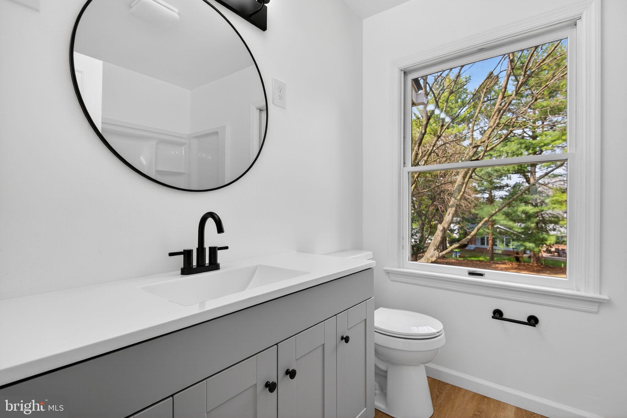 2348 Henbird Lane Lancaster, PA 17601 - Photo 29 of 58 a bathroom with a sink and a mirror