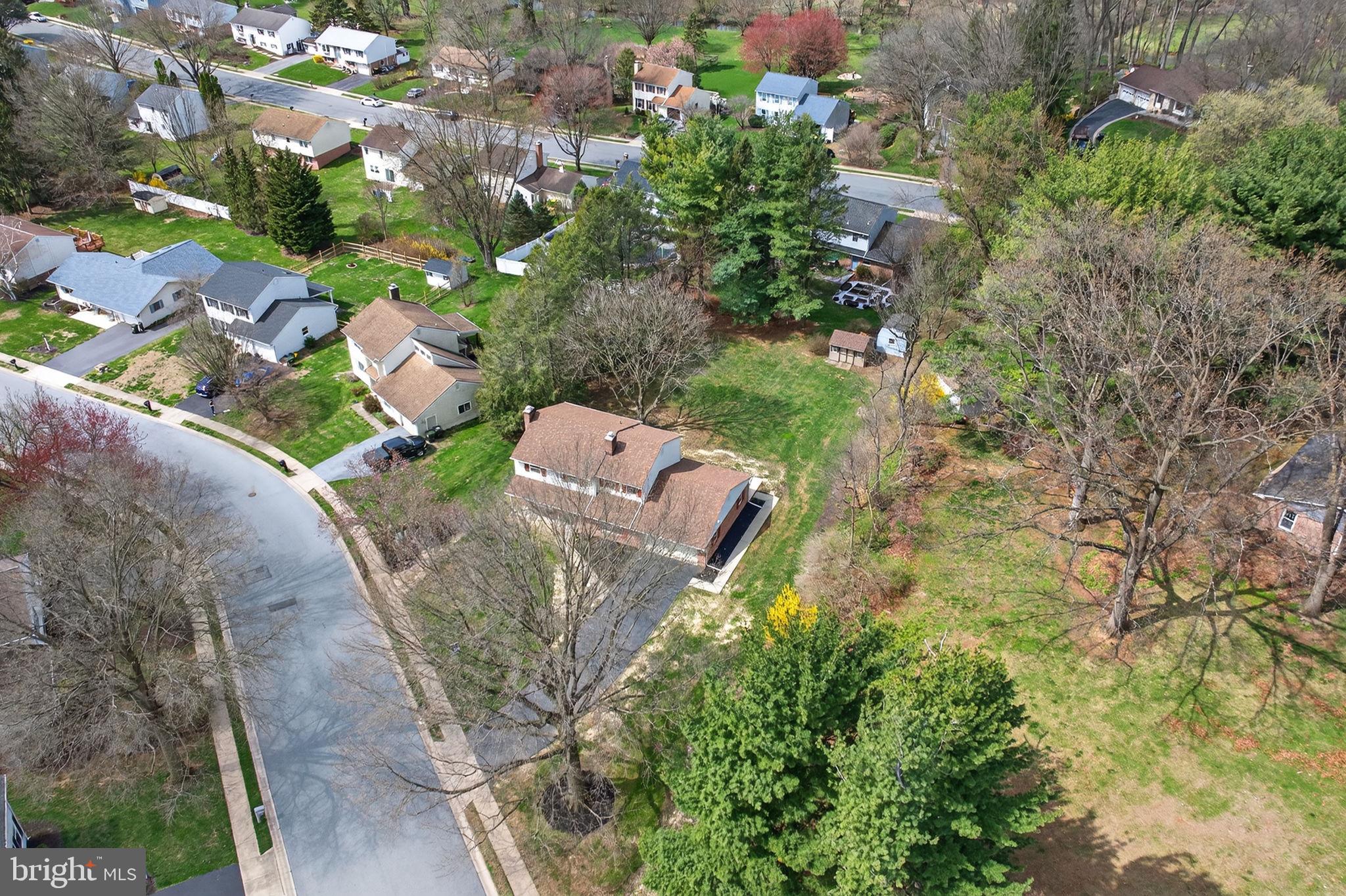 2348 Henbird Lane Lancaster, PA 17601 - Photo 50 of 58 an aerial view of a house with yard and outdoor seating
