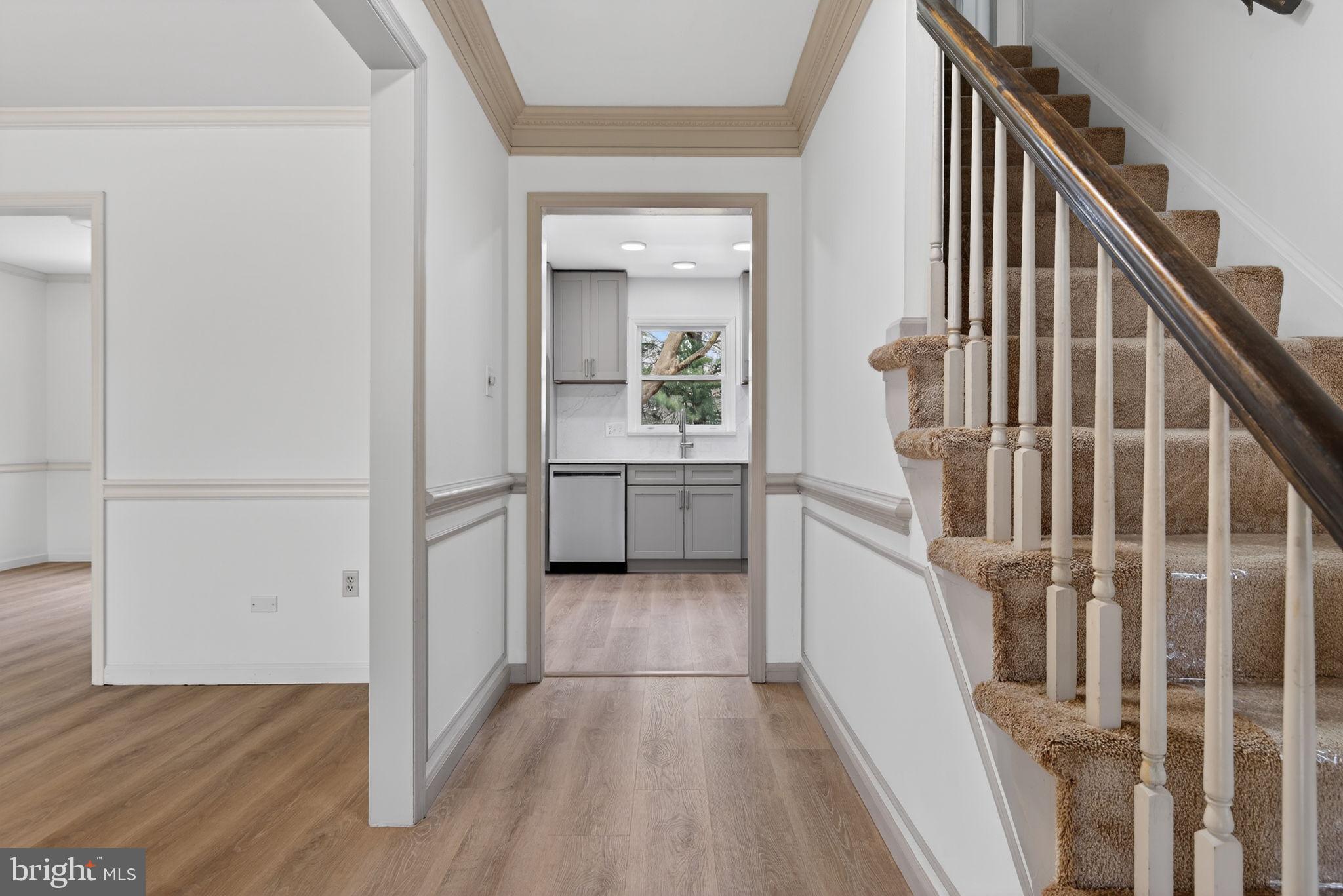 2348 Henbird Lane Lancaster, PA 17601 - Photo 6 of 58 a view of a hallway with wooden floor and entryway