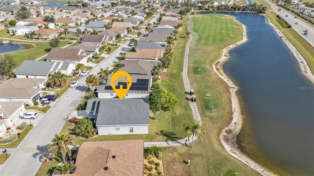 24088 Buckingham Way Punta Gorda, FL 33980 - Photo 16 of 37 an aerial view of a house with a swimming pool