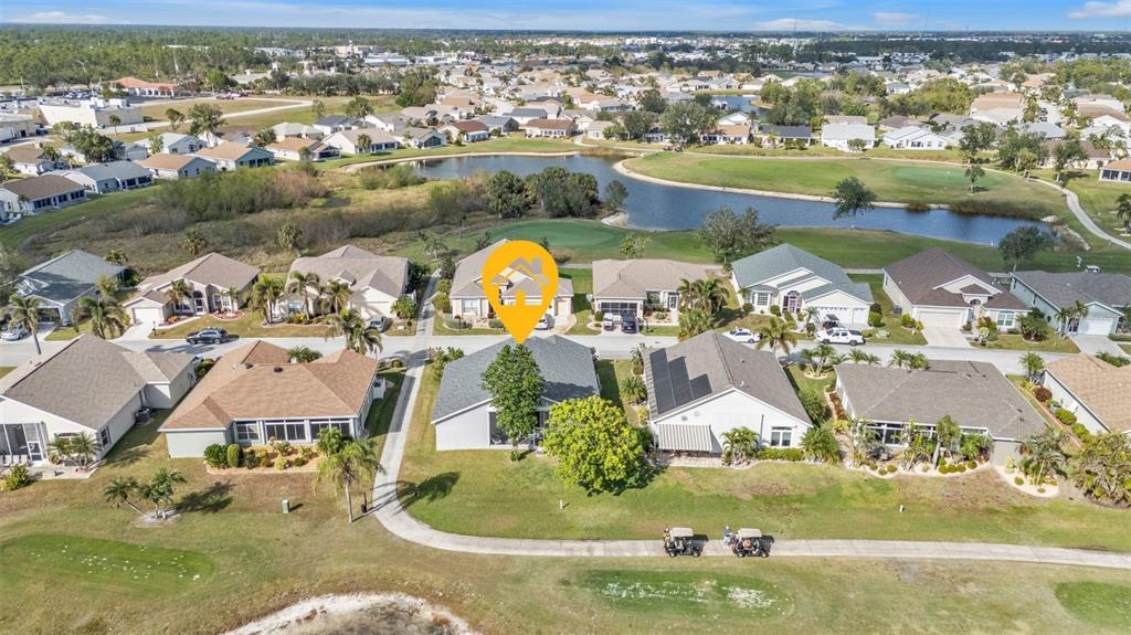 24088 Buckingham Way Punta Gorda, FL 33980 - Photo 17 of 37 an aerial view of residential houses with outdoor space