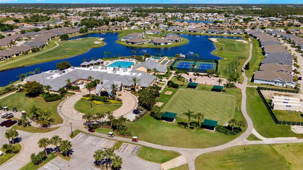 24088 Buckingham Way Punta Gorda, FL 33980 - Photo 18 of 37 an aerial view of a pool patio swimming pool and outdoor seating
