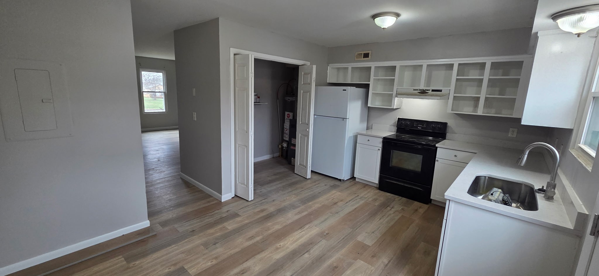 431 McClary Road, Unit B Smyrna, TN 37167 - Photo 2 of 11 a kitchen with a refrigerator and a sink