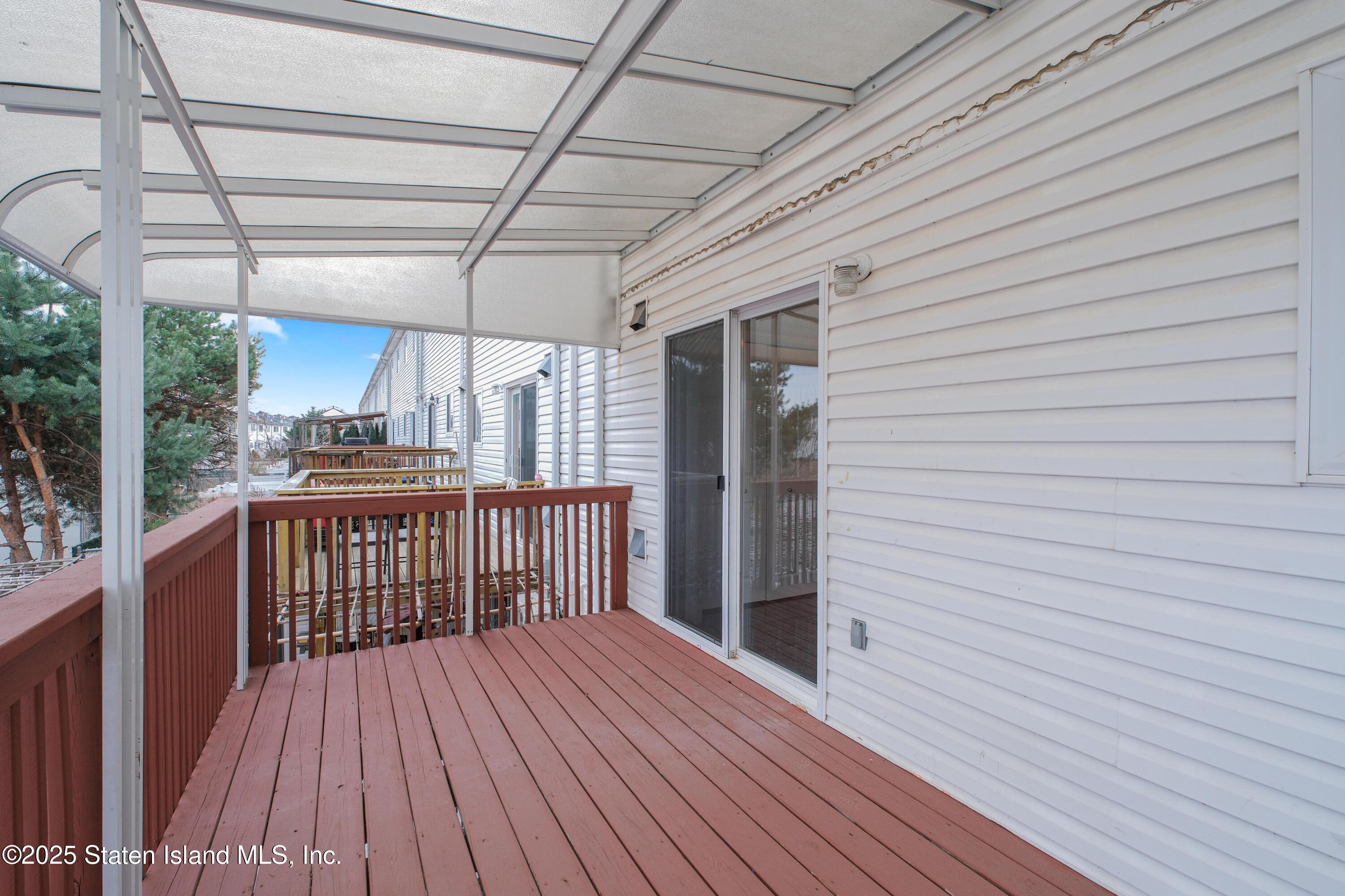 14 Ragazzi Lane Staten Island, NY 10305 - Photo 27 of 40 a view of a patio with wooden floor