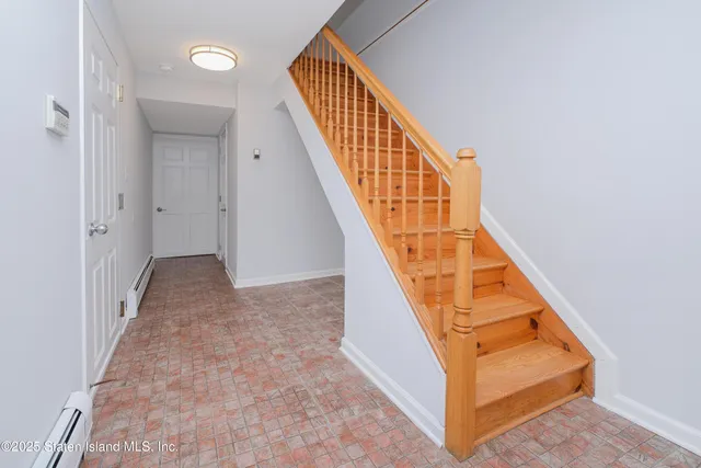 wooden floor with staircase