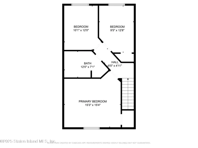 a picture of a bench in front of a wall